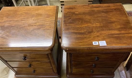 A pair of modern mahogany three drawer bedside chests, width 49cm depth 42cm height 66cm